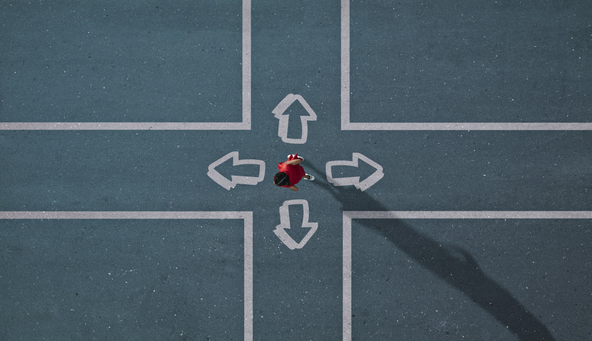 A person walking on a road with arrows, guiding him to find a suitable job.