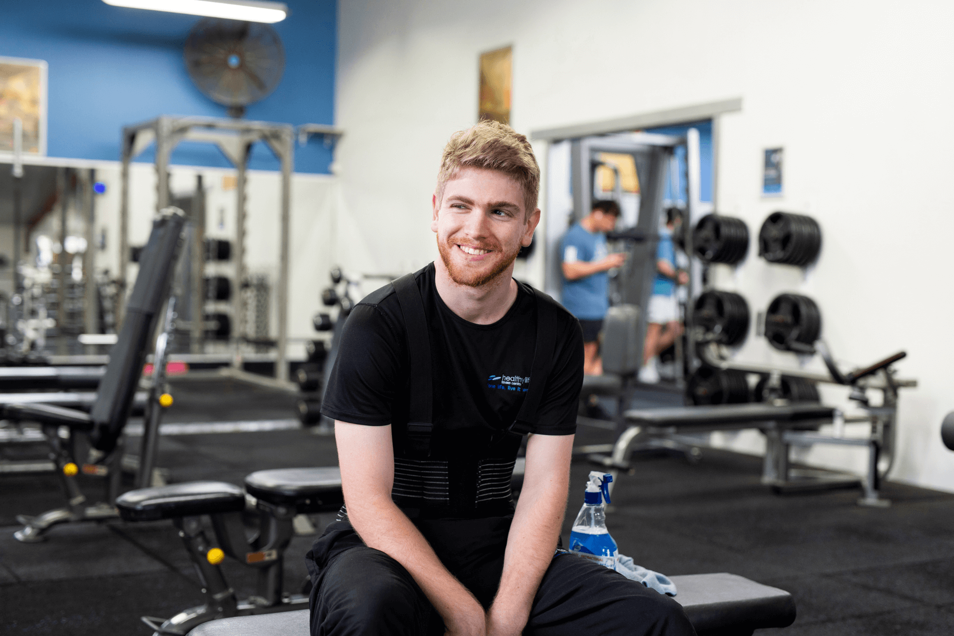 Nicholas smiling in his job after overcoming the barrier of a disability to find work