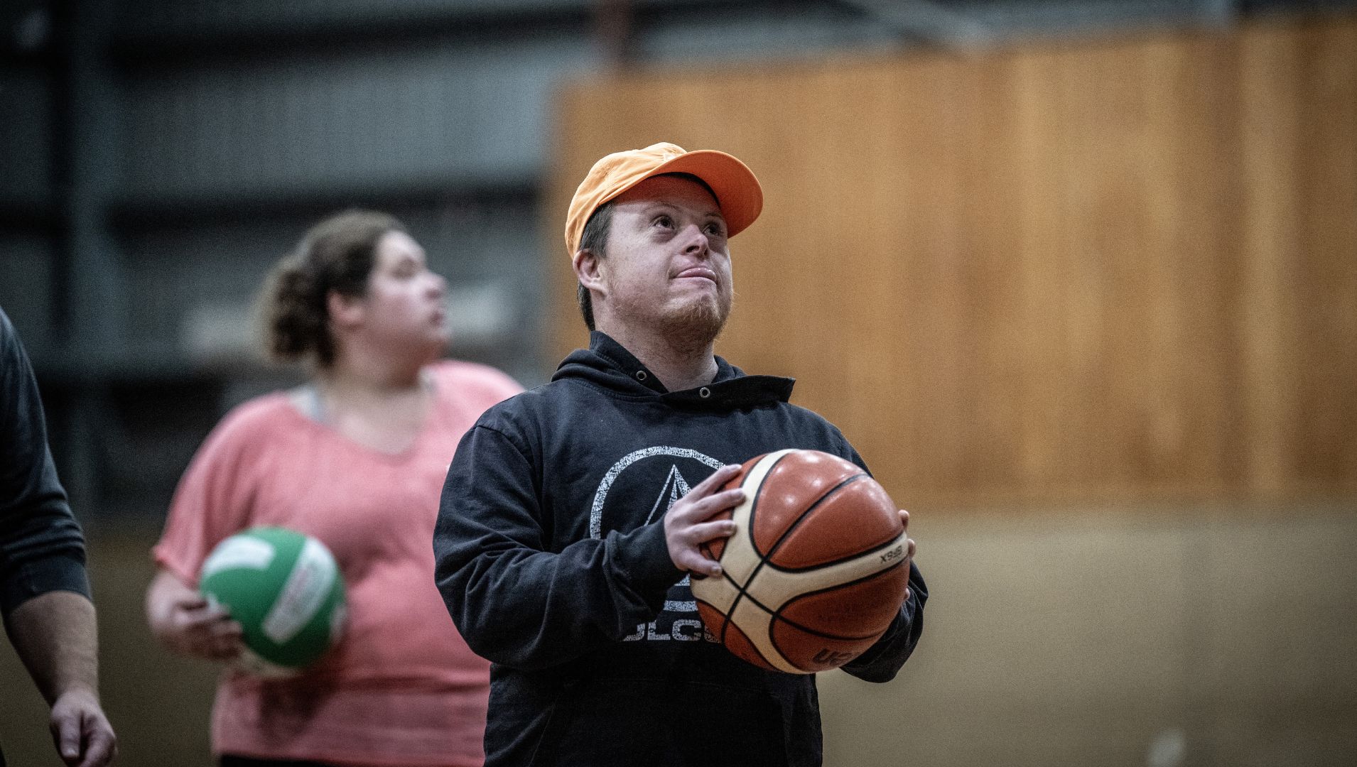 Basketball player prepares to shoot in the all abilities side