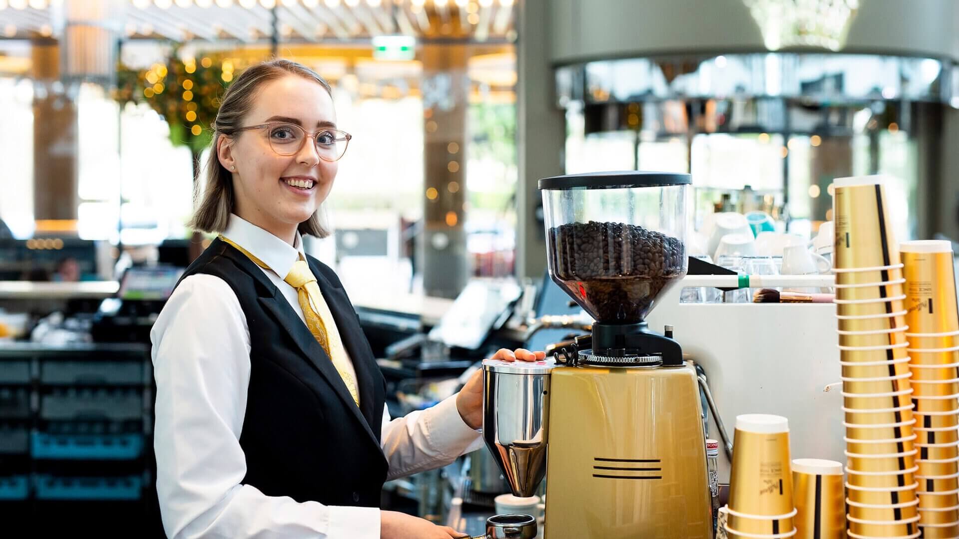 DES participant Maegan making coffee
